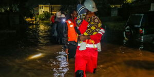 A team from the Kenya Red Cross rescuing residents in Imara Daima after heavy rainfall on May 3, 2024