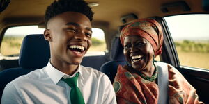 Mother and son sharing a joyful moment in a car.