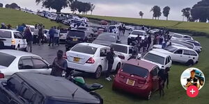 Kenyans park on the roadside at a Park and Chill venue in Kiambu County.
