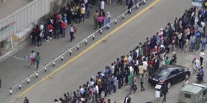 Kenyans queued in Nairobi streets for services.