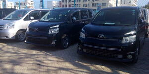 A photo of private vehicles offering PSV services in Nairobi. 