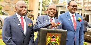 From left: Economic Planning PS James Muhati, Treasury CS Njuguna Ndung'u and Treasury PS Chris Kiptoo at Parliament Buildings on June 15, 2023.